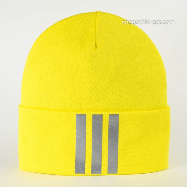 Демисезонная трикотажная шапка Макс желтого цвета